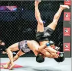  ?? ONE ?? China’s Peng Xue Wen slams Cambodia’s Phat Soda to the mat at ONE: Legends of the World in Manila on Friday night.