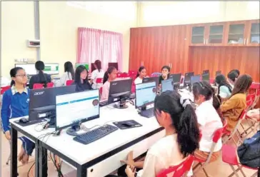  ?? MOEYS ?? Students take extra-curricular ICT and entreprene­urship classes at a secondary school in February.