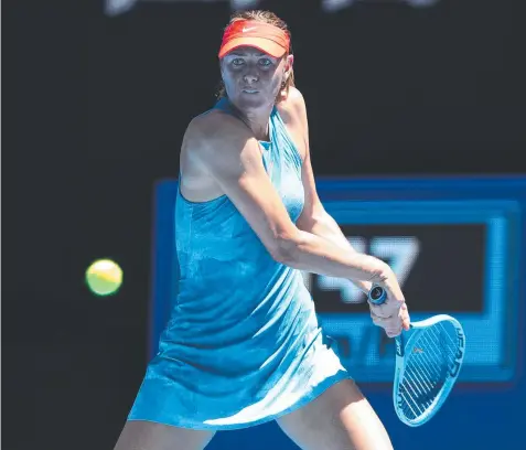  ??  ?? TOTAL FOCUS: Maria Sharapova in action against Harriet Dart of Great Britain during day one of the Australian Open tennis