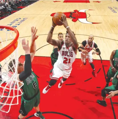  ?? | GARY DINEEN/GETTY IMAGES ?? Jimmy Butler had a team-high 19 points and 10 assists on Thursday night against the Boston Celtics.