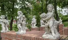  ?? Pittsburgh Post-Gazette ?? Hand-carved cherubs that Henry Koerner got from Italy still stand at the house where he lived in Squirrel Hill.