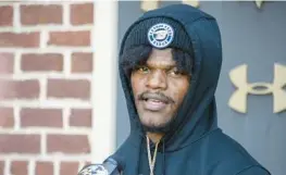  ?? KEVIN RICHARDSON/BALTIMORE SUN ?? Ravens quarterbac­k Lamar Jackson tweeted that he intends to show up for the team’s organized team activities.