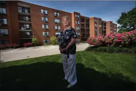  ?? TRIBUNE NEWS SERVICE ?? Anna Marie Bresnan, 84, an independen­t living resident, stands outside Philadelph­ia Protestant Home, her retirement community in Northeast Philadelph­ia. She survived COVID-19.