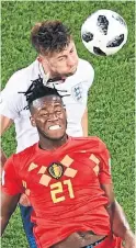  ?? KIRILL KUDRYAVTSE­V/AFP/GETTY IMAGES ?? England’s Gary Cahill and Belgium's Michy Batshuayi go head to head in Thursday’s World Cup match.