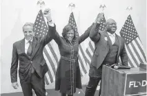  ?? DANIEL A. VARELA dvarela@miamiheral­d.com ?? Democratic U.S. Senate nominee Val Demings, center, raises her hands alongside Florida Democratic Party Chairman Manny Diaz Sr., left, and Broward Democratic Party Chair Rick Hoye, during an August “unity rally” hosted by the county and state parties, in Tamarac, Florida.