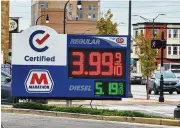  ?? NICK GRAHAM / STAFF ?? A gallon of unleaded gas at Marathon on High Street in Hamilton reached $3.99 on Thursday. Statewide data from AAA listed the average Ohio gas price at $3.93 Thursday, up 24 cents from a week ago.