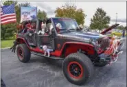  ??  ?? Alan Kennedy really got into the spirit of Halloween and decorated his 2016 Jeep Wrangler Rubicon to the hilt. Alan won the “Coolest Halloween Theme” trophy at Berks County Mustang Car Club’s Trunk or Treat Car Show at Cabela’s in Tilden Township.