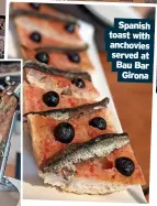  ?? ?? Spanish toast with anchovies served at Bau Bar Girona