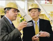  ?? Jacqueline Mcbride / National Ignition Facility ?? Ed Moses (left), then-head of the National Ignition Facility in Livermore, meets with Steven Chu, then-secretary of the U.S. Department of Energy.