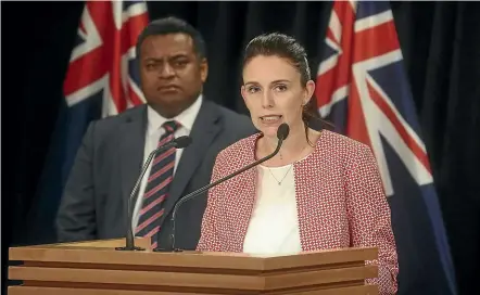  ?? KEVIN STENT/STUFF ?? Prime Minister Jacinda Ardern, with Commerce Minister Kris Faafoi, announces the changes.