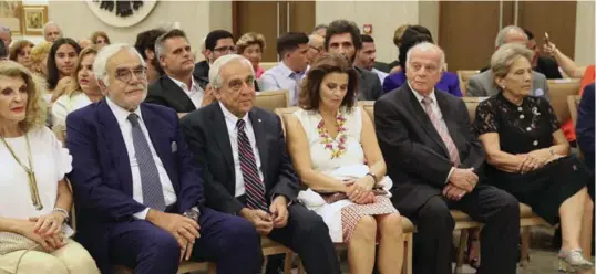  ??  ?? Andreas Pittas (2nd left), Costas Papanicola­s, Nicos Rolandis (2nd right) and his wife Lelia at the award ceremony in 2019