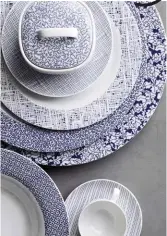  ??  ?? The delicate, organic Cipango Blue design from Rosenthal, whose expressive blue acts as an elegant complement to the simple design, was created for the Jasper Morrison’s Moon design. The concept behind Cipango Blue is that different decorative markings – bold curls, delicate textile patterns, minimalist­ic, floral line drawings – create endless design variations when individual pieces of crockery are combined. Remarkably, the 29 articles in this collection feature 22 different designs.