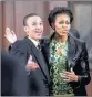  ?? PICTURE: REUTERS ?? INSPIRED: Mikhail Hendricks, then 16, embracing Michelle Obama in 2011.