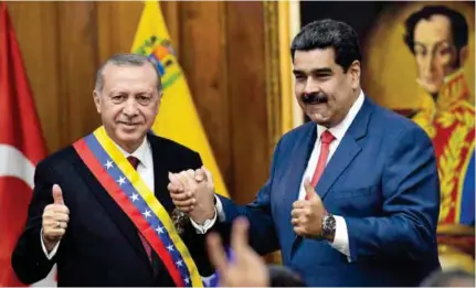  ?? (AFP) ?? UNIDOS. Los presidente­s de Turquía y Venezuela volvieron a sellar su amistad con la visita del primero a Caracas.
