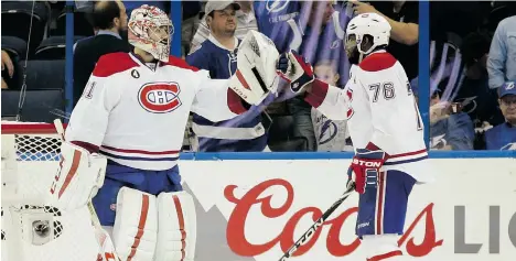  ?? WILFREDO LEE/THE ASSOCIATED PRESS ?? Habs goalie Carey Price and blue-liner P.K. Subban congratula­te each other after Thursday’s 6-2 win over the Lightning.