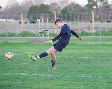  ??  ?? Above: Bunyip goalkeeper Kieran Lenders clears from defence.