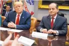  ?? EVAN VUCCI/ASSOCIATED PRESS ?? President Donald Trump and Labor Secretary Alexander Acosta in Washington in September 2018. Trump praised Acosta’s work Tuesday, but said he would look into the Jeffrey Epstein plea deal.