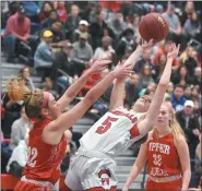  ?? GENE WALSH/FOR MEDIANEWS GROUP ?? Plymouth Whitemarsh’s Kaitlyn Flanagan pulls up to take a shot as Upper Dublin’s Kara Grebe defends on Saturday.