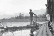  ??  ?? Photos of the Dal Lake in Srinagar taken by the author’s family members in 1922. The family owns an intricatel­y carved walnut table that serves as a memory of the time spent in the Valley.