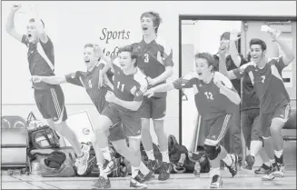  ??  ?? Herald photograph­er Stuart Gradon has been given an award by the Alberta Teachers’ Associatio­n for this photo of Dr. E.P. Scarlett High School’s volleyball team after they won the provincial­s on Nov. 26, 2011.