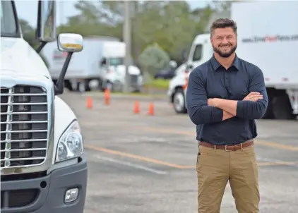  ?? MIKE LANG/HERALD-TRIBUNE ?? Tra Williams owns ten FleetForce Truck Driver Training schools in Florida. His new business, ParkPro, is trying to come up with solutions for secure overnight parking for semi-tractor trucks.