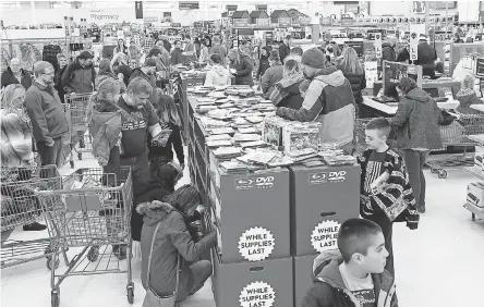  ?? JOHN ROARK/ THE POST- REGISTER VIA AP ?? Shoppers at Walmart in Idaho Falls, Idaho, on Black Friday, 2018.