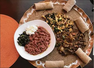  ?? AMELIA ROBINSON / STAFF ?? Nanya Café, on North Dixie Drive in Harrison Twp., Montgomery County, has added alcohol to its menu. The restaurant serves Ethiopian food.