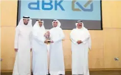  ??  ?? KUWAIT: Ali Bin Shaibah from ABK receives the recognitio­n award from MGRP officials.