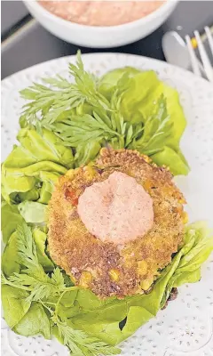  ?? GRETCHEN MCKAY/PITTSBURGH POST-GAZETTE ?? “Crabcakes are an essential part of Southern coastal cooking,”alexander Smalls writes in “Meals, Music, and Muses.”
