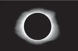  ?? Associated Press ?? The total solar eclipse passed over Clemson, S.C., at 2:37 p.m. EST and lasted 2 minutes and 37 seconds.