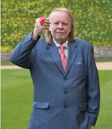  ?? ?? MEDALLION MAN:
RICK PROUDLY DISPLAYING HIS CBE AFTER A CEREMONY AT WINDSOR CASTLE LAST APRIL.