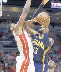  ?? ALAN DIAZ/AP ?? Pacers forward Paul George was ejected from Saturday’s Heat game in the third quarter after cursing at referee Gary Zielinski.