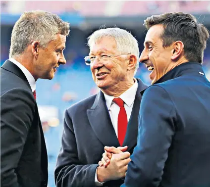  ?? ?? Beyond a joke: A penny for Gary Neville (right) and Sir Alex Ferguson’s (centre) thoughts on the management of Ole Gunnar Solskjaer