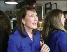  ?? SARA BURNETT — THE ASSOCIATED PRESS ?? In this file photo, Democratic candidate for the 3rd congressio­nal district Marie Newman speaks with supporters at a campaign event in LaGrange, Ill. Ahead of the fall midterm elections, Democrats have contested primaries around the country that will...