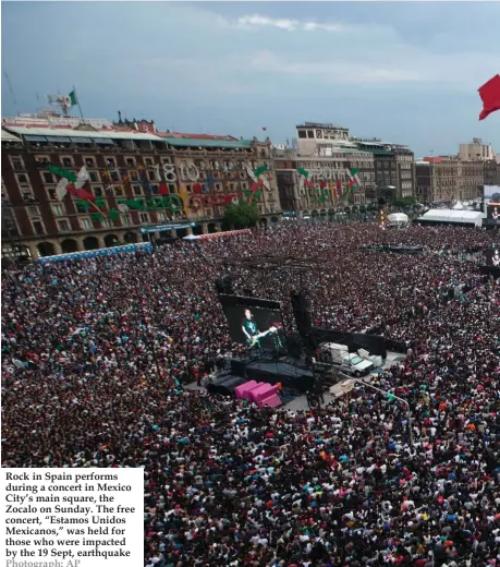  ??  ?? Rock in Spain performs during a concert in Mexico City’s main square, the Zocalo on Sunday. The free concert, “Estamos Unidos Mexicanos,” was held for those who were impacted by the 19 Sept, earthquake Photograph: AP