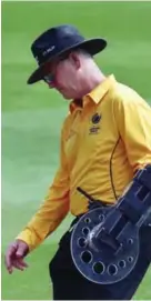  ?? ?? LONDON: Umpire Bruce Oxenford wears a protective arm guard during the ICC Champions Trophy Warm-up match between India and New Zealand at The Oval in London yesterday. — AFP