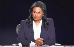  ?? AP ?? Moderator Kristen Welker of NBC News listens as President Donald Trump and Democratic presidenti­al candidate Joe Biden debate on Thursday.