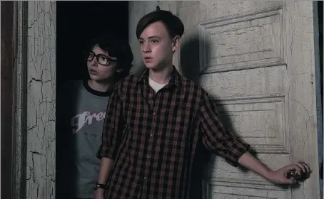  ?? WARNER BROS ?? Finn Wolfhard, left, with Jaeden Lieberher, in a scene from the horror remake, It, which is based on Stephen King’s 1986 novel.