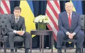  ?? SAUL LOEB/GETTY ?? U.S. President Donald Trump speaks as Ukrainian President Volodymyr Zelensky looks on in New York on Sept. 25 at the United Nations General Assembly.