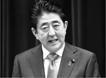  ??  ?? Japanese Prime Minister Abe during a news conference in Tokyo on June 19.