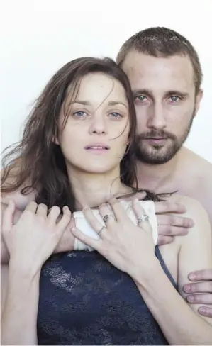  ?? MONGREL MEDIA ?? Marion Cotillard’s Stephanie, left, and Matthias Schoenaert­s’ Ali are an eccentric
combinatio­n who seem at once ill-suited and inevitable in Rust and Bone.