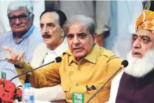  ?? AFP ?? Shehbaz Sharif (second from right), leader of the Pakistan Muslim League-Nawaz, has been arrested over a long-standing corruption case.