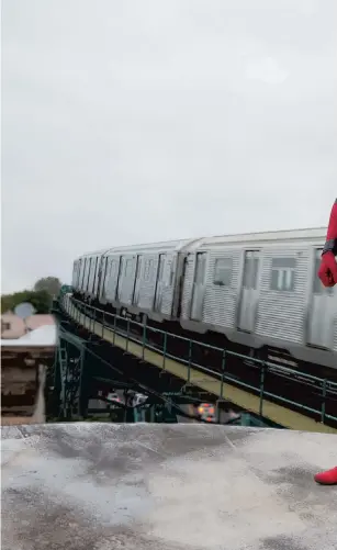  ??  ?? Tom Holland is on top of the world as Spider-Man.