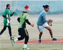  ?? AFP ?? Pakistani rugby players take part in a practice session in Lahore. Women’s rugby is on the rise in the country.