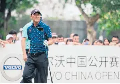  ?? AFP ?? Zhang Lianwei watches his shot during the 2019 Volvo China Open.