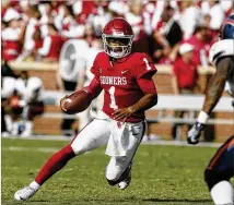  ?? SUE OGROCKI / ASSOCIATED PRESS FILE ?? Quarterbac­k Kyler Murray, who signed with the Athletics after being selected in the first round of the MLB draft Monday, will be allowed to play for Oklahoma this season.