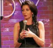  ?? SUBMITTED ?? Tammy Pescatelli is shown doing stand-up comedy.