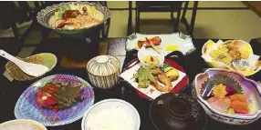  ??  ?? The traditiona­l cuisine of Japan is based on rice with miso soup and side dishes consisting of fish, pickled vegetables, and vegetables cooked in broth. Seafood is common, often grilled, but also served raw as sashimi or sushi.
