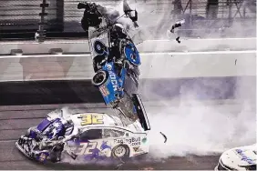  ?? CHRIS O’MEARA/ASSOCIATED PRESS FILE ?? The No. 6 car driven by Ryan Newman goes airborne in last year’s Daytona 500 before skidding to a halt on hits roof. Newman walked out of a hospital 48 hours later.