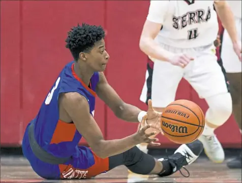  ?? Steph Chambers/Post-Gazette ?? Jeannette's Tre Cunningham has had little time to sit and rest. The three-sport standout has led the Jayhawks' baseball and football teams to WPIAL titles, and now is setting his sights on basketball gold.